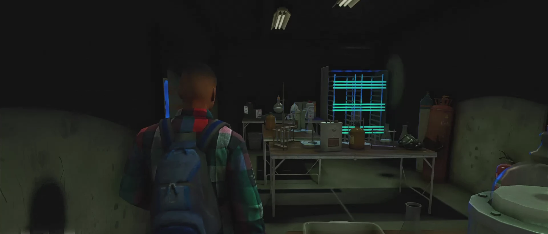 Le laboratoire clandestin Methlab et ses équipements dans un intérieur industriel.
